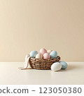 Colorful Pastel Eggs Nestled in a Woven Basket Against a Neutral Backdrop for Spring Decoration 123050380