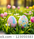 Colorful Easter Eggs Nestled in a Blooming Spring Garden With Tulips and Daisies 123050383