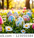 Colorful Easter Eggs Placed Among Blooming Flowers in a Sunny Park During Springtime Celebrations 123050384