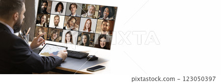 Banner. Business professional pointing at screen, leading online discussion with diverse virtual team displayed on monitor against minimalist office. 123050397