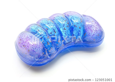 Glittery blue and purple soap dish resting on white background 123051001