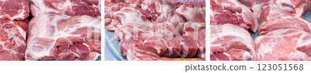 Fresh pieces of pork on the market counter. Selective focus 123051568