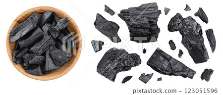 Natural charcoal in wooden bowl isolated on white background with full depth of field. Top view. Flat lay 123051596