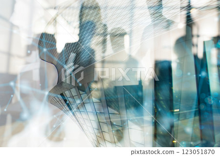 Modern architecture blending with business people in a futuristic cityscape Modern architecture blending with business people in a futuristic cityscape 123051870