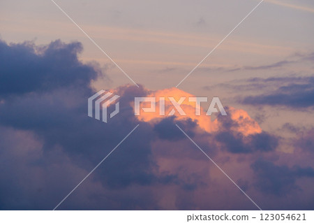Vibrant Sunset Clouds with Warm Glow. 123054621