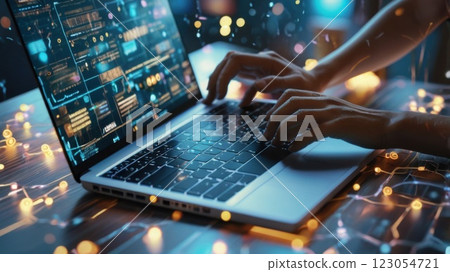 Close-up on Hands: Programmer With Disability Using Prosthetic Arm to Work on Laptop Computer.  123054721