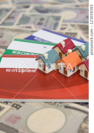 Money, bankbook and house 123056565