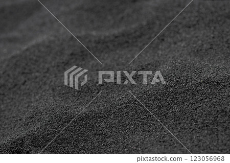 Texture of black volcanic sand on the Hawaii ocean beach. Texture of black volcanic sand on the Hawaii ocean beach. 123056968