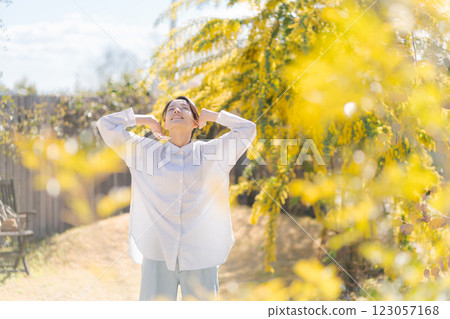 A young woman walking in the garden A young woman walking in the garden 123057168