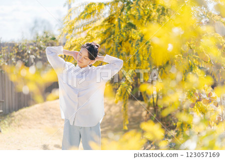 A young woman walking in the garden 123057169