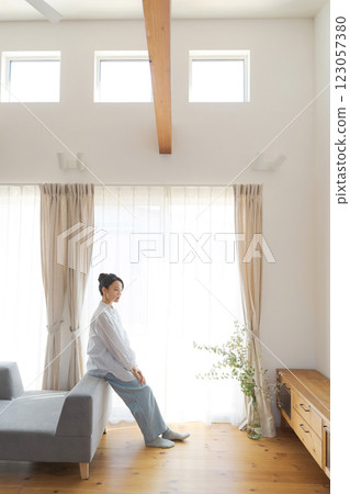 A woman relaxing in the living room 123057380
