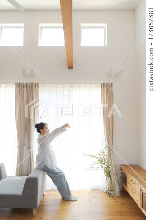 A woman relaxing in the living room 123057381