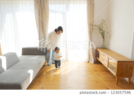 Parents and children relaxing in their home 123057596