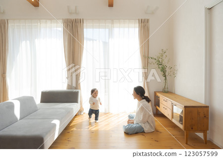 Parents and children relaxing in their home 123057599