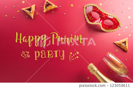 Happy Purim carnival decoration concept made from golden mask star and glitter on red background. (Happy Purim in Hebrew, jewish holiday celebrate) 123058611
