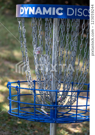 Close up Disk golf in public park Close up Disk golf in public park 123059244