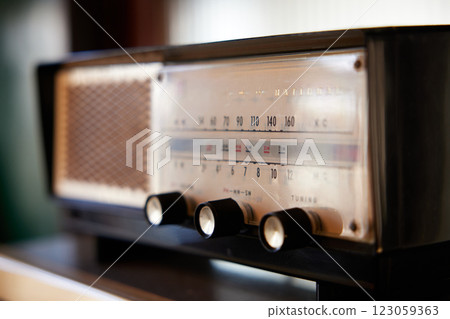 Music is playing from an old radio in the mansion. Music is playing from an old radio in the mansion. 123059363