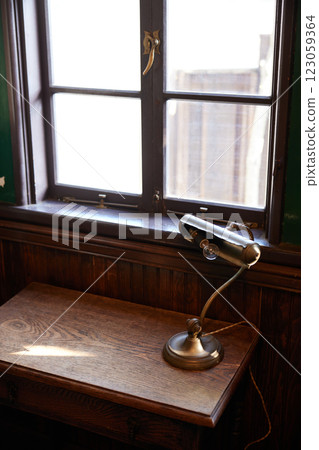 A retro lamp placed on a window in a Western-style building A retro lamp placed on a window in a Western-style building 123059364