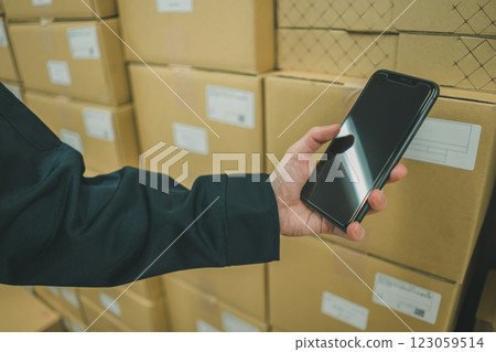 Mail order business Smartphone picking 123059514
