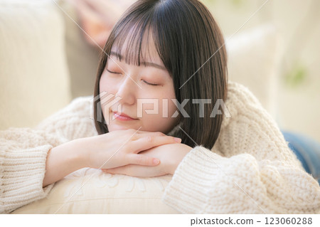 A woman lying on the sofa 123060288