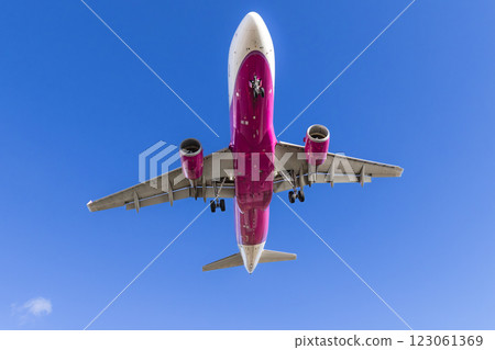 A plane landing at Sendai International Airport 123061369