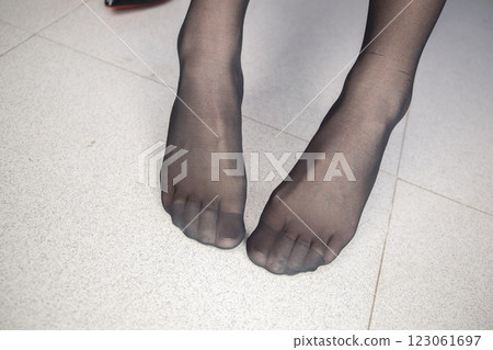 Stockings and legs 123061697