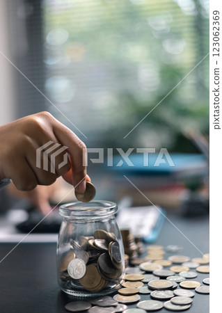 Finance bank tax expense accounting budget money businessman hand use calculator Financial calculate accountant close up calculator with graph chart write office desk Business expense analysis saving Finance bank tax expense accounting budget money businessman hand use calculator Financial calculate accountant close up calculator with graph chart write office desk Business expense analysis saving 123062369