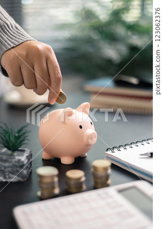 Finance bank tax expense accounting budget money businessman hand use calculator Financial calculate accountant close up calculator with graph chart write office desk Business expense analysis saving Finance bank tax expense accounting budget money businessman hand use calculator Financial calculate accountant close up calculator with graph chart write office desk Business expense analysis saving 123062376
