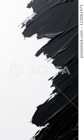 Abstract black paint strokes on clean white canvas create striking contrast 123062473