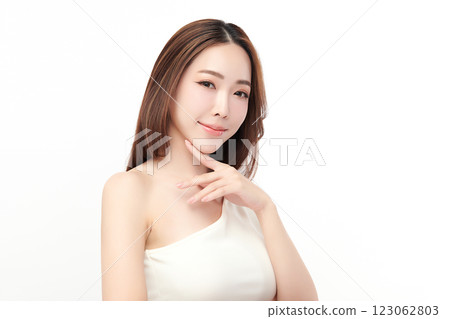 Beautiful young asian woman with clean fresh skin on white background, Face care, Facial treatment, Cosmetology, beauty and spa, Asian women portrait. Beautiful young asian woman with clean fresh skin on white background, Face care, Facial treatment, Cosmetology, beauty and spa, Asian women portrait. 123062803