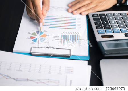 Finance bank tax expense accounting budget money businessman hand use calculator Financial calculate accountant close up calculator with graph chart write office desk Business expense analysis saving Finance bank tax expense accounting budget money businessman hand use calculator Financial calculate accountant close up calculator with graph chart write office desk Business expense analysis saving 123063073