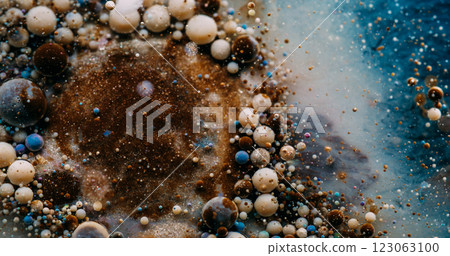 Paint flow. Bubble emulsion. Mystical brown blue water mix floating colorful drops explosion. Wave pouring defocused abstract background. Paint flow. Bubble emulsion. Mystical brown blue water mix floating colorful drops explosion. Wave pouring defocused abstract background. 123063100