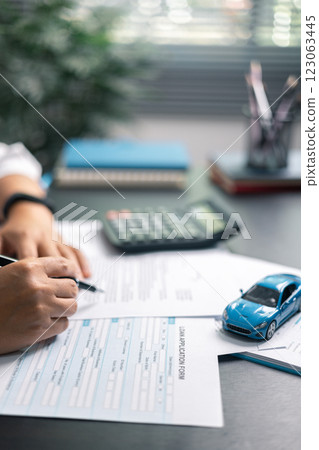 Finance bank tax expense accounting budget money businessman hand for Business expense analysis saving use car Financial calculate accountant close up calculator with graph chart write office desk 123063445