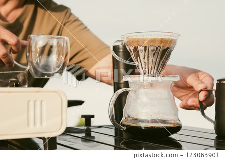 Morning coffee concept of cafe focus on nurturing coffee in harmony with nature organic seed create warm cup caffeine background green fresh great outdoor. aromatic drink rich aroma of rising from mug 123063901