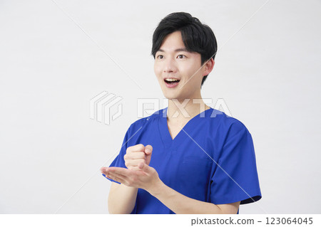 Doctor, nurse, dentist, caregiver, male, inspiration, white background 123064045