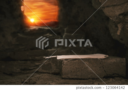 Easter resurrection concept. Jesus Christ resurrection. Empty tomb of Jesus with light. Born to Die, Rise. savior messiah redeemer gospel alive miracle. Christian religion. He is not here he is risen 123064142