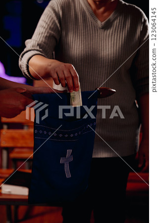 Close up christians hands pray to God with spiritual faith on holy bible in catholic church religion worship prayer ask god bless pray grace jesus believe Christianity religion prayer holy worship. 123064145