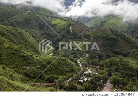 Landscape of Morning Mist with Mountain Layer at north of Thailand. mountain ridge and clouds in rural jungle bush forest 123064947
