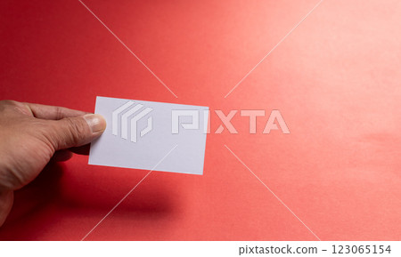 person with card 123065154