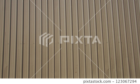 Urban Minimalism. Neutral-toned metal wall with geometric rhythm 123067294
