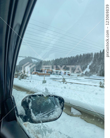 Snowy Landscape Viewed from Car Window Snowy Landscape Viewed from Car Window 123069839