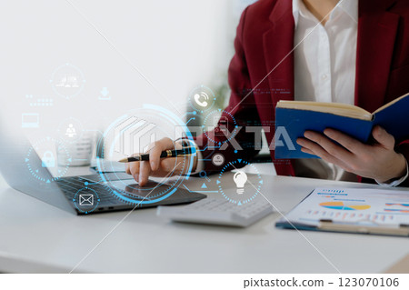 Copyright or patent concept, Person hand using laptop computer, tablet and smartphone with virtual screen copyright icon trademark, Creation ownership against piracy at office. 123070106