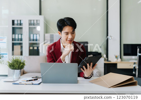 Happy man, entrepreneur, small business owner working online. Happy man, entrepreneur, small business owner working online. 123070119