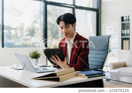 Happy man, entrepreneur, small business owner working online. Happy man, entrepreneur, small business owner working online. 123070120