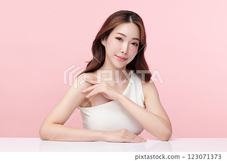 Beautiful young asian woman with clean fresh skin on pink background, Face care, Facial treatment, Cosmetology, beauty and spa, Asian women portrait. Beautiful young asian woman with clean fresh skin on pink background, Face care, Facial treatment, Cosmetology, beauty and spa, Asian women portrait. 123071373