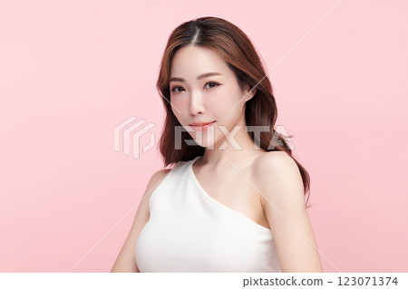 Beautiful young asian woman with clean fresh skin on pink background, Face care, Facial treatment, Cosmetology, beauty and spa, Asian women portrait. Beautiful young asian woman with clean fresh skin on pink background, Face care, Facial treatment, Cosmetology, beauty and spa, Asian women portrait. 123071374