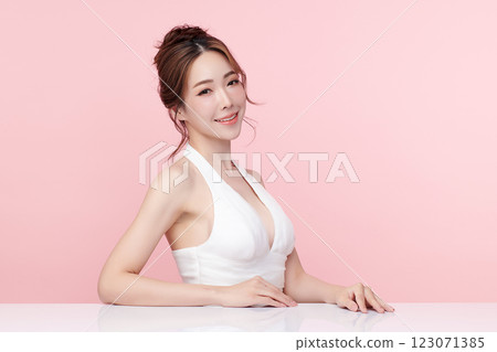 Beautiful young asian woman with clean fresh skin on pink background, Face care, Facial treatment, Cosmetology, beauty and spa, Asian women portrait. 123071385