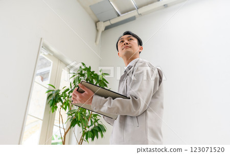 A man performing maintenance 123071520