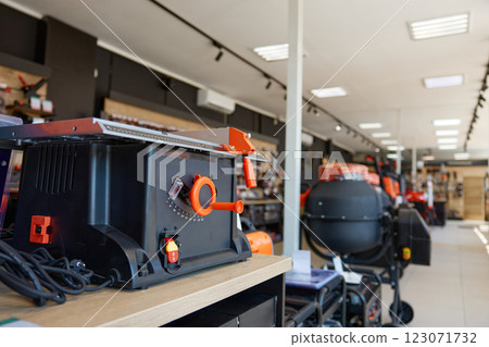 Modern table saw display at professional hardware store offering woodwork tools 123071732