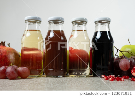 Apple, pomegranate, white wine and balsamic vinegars among fruits Apple, pomegranate, white wine and balsamic vinegars among fruits 123071931